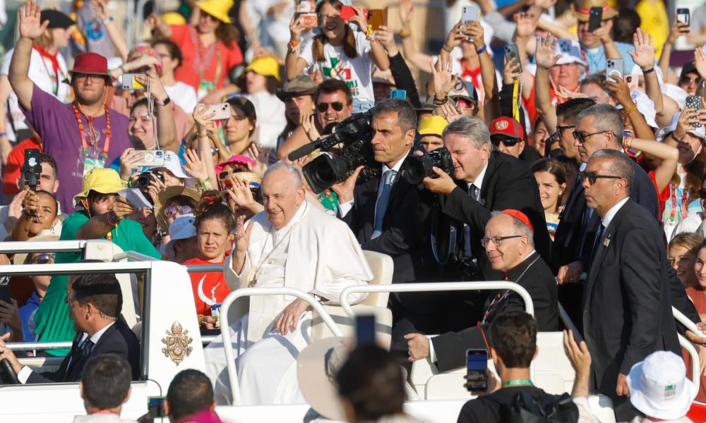Pope Francis, accompanied by Cardinal Manuel Clemente of Lisbon, Portugal, arrives at Tejo Park in Lisbon for the closing World Youth Day Mass (CNS photo/Lola Gomez