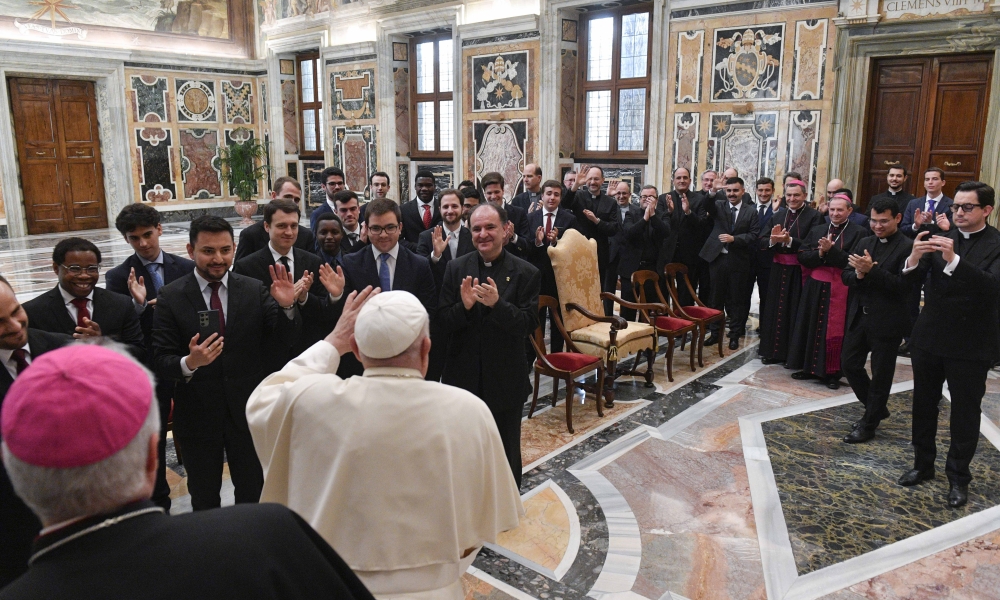Pope Francis greets a group of seminarians and bishops from the Archdiocese of Burgos, Spain, during a meeting at the Vatican April 27, 2024.
