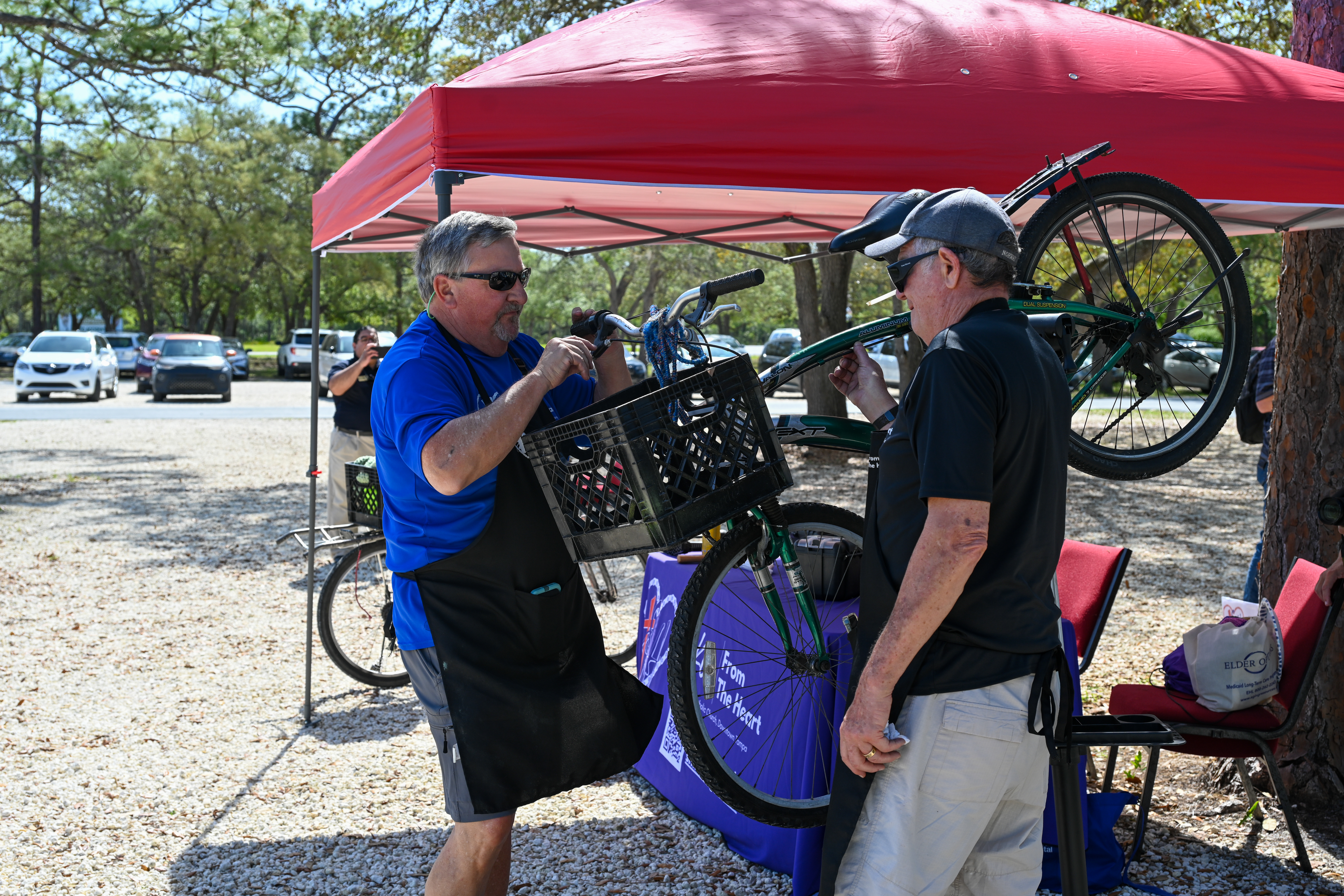 Sacred Heart's Bikes from the Heart provided free bike maintenance to those in need on April 17, 2024, at St. Thomas the Apostles Homeless Outreach Event. | Photo by Keishla Espinal