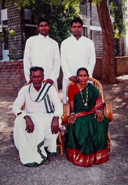 Father Bob Romaine and his brother, Father Bhaskar, with their parents Joseph and Anna Mary Gangolu.