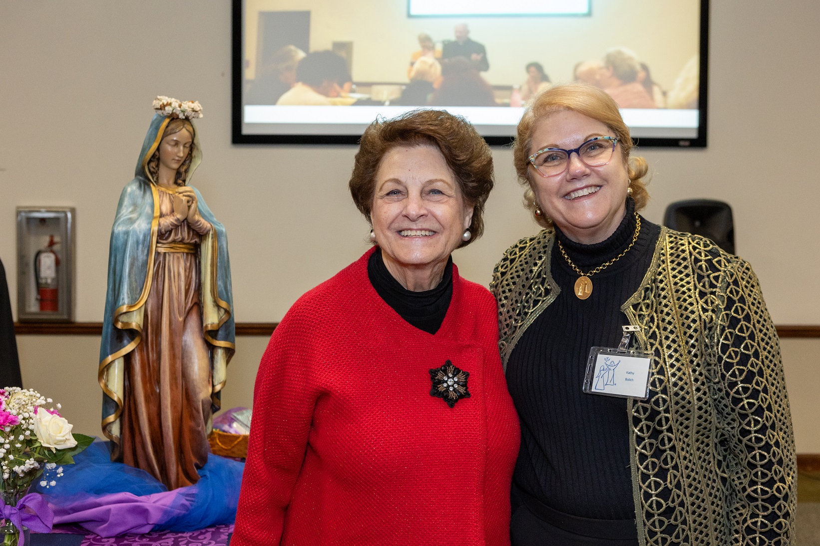 Kathy Bolich (right), coordinator for the St. Petersburg chapter of Magnificat, at the anniversary breakfast