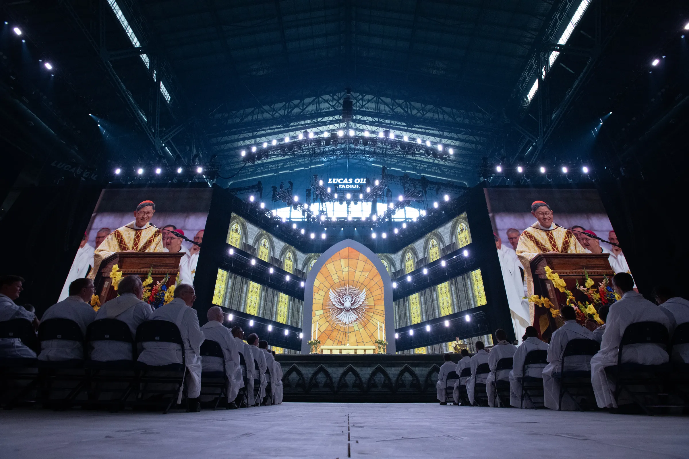 Cardinal Luis Antonio Tagle presides over the closing Mass in Indianapolis Lucas Oil Stadium on July 21, 2024, as Pope Francis’ special envoy for the event. | Photo by Jeffrey Bruno