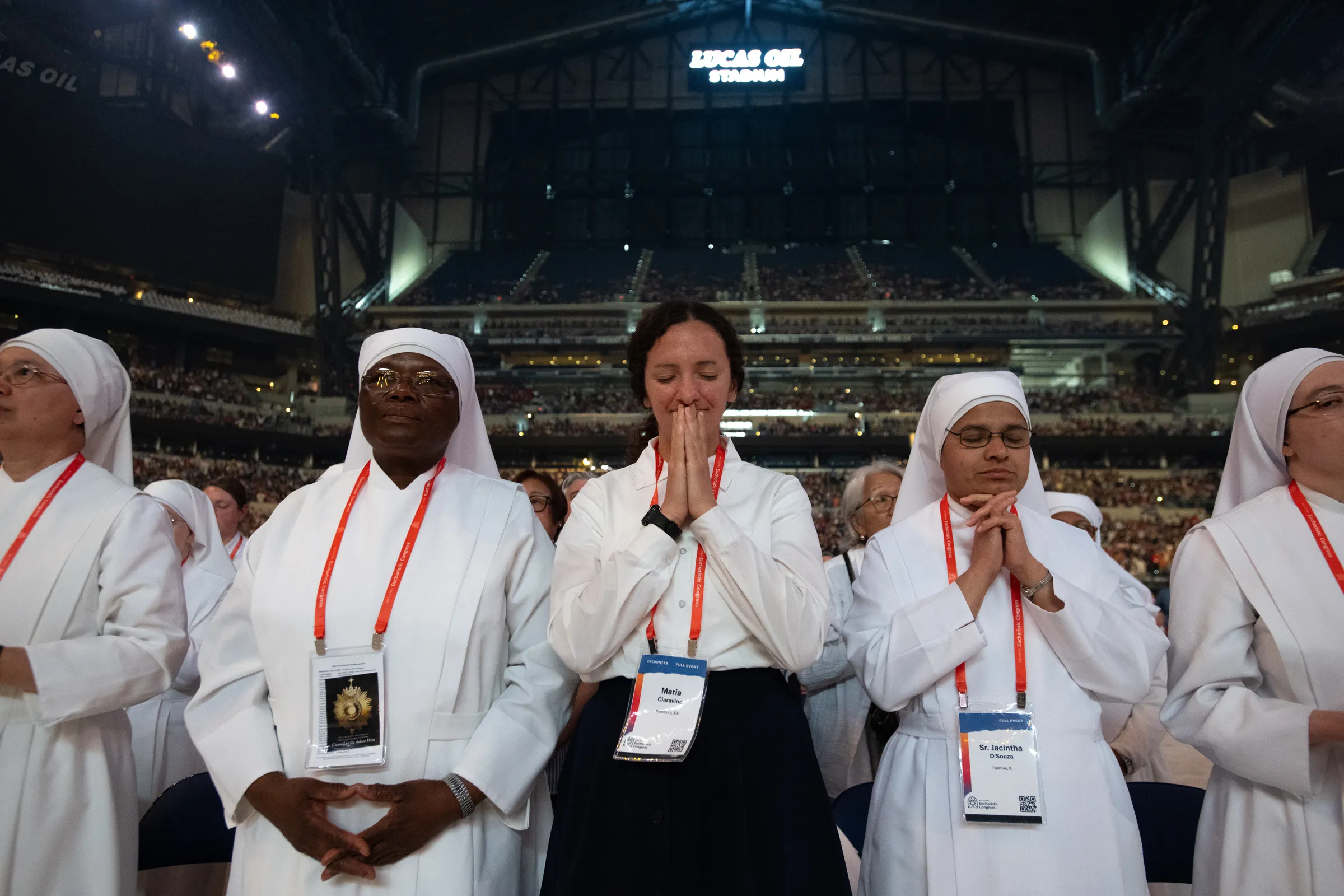 Religious sisters pray at the closing Mass of the National Eucharistic Congress on July 21, 2024. | Photo by Jeffrey Bruno.