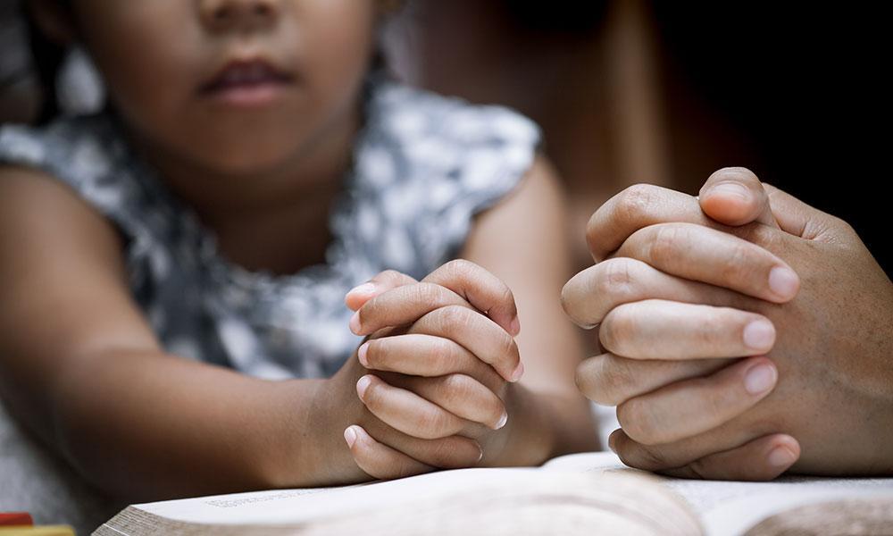 praying with child