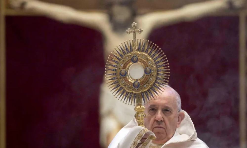 Pope Francis holding a monstrance