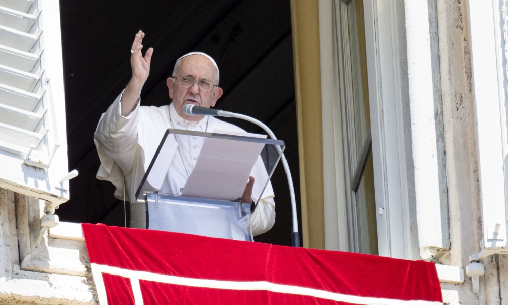 Pope Francis praying the Angelus with the crowd