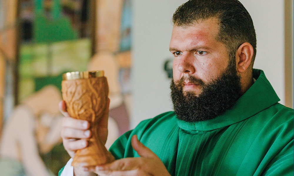 The Priest Who Prays With the Bucs