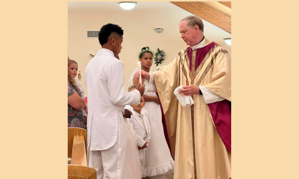 Father Johnson celebrating sacraments