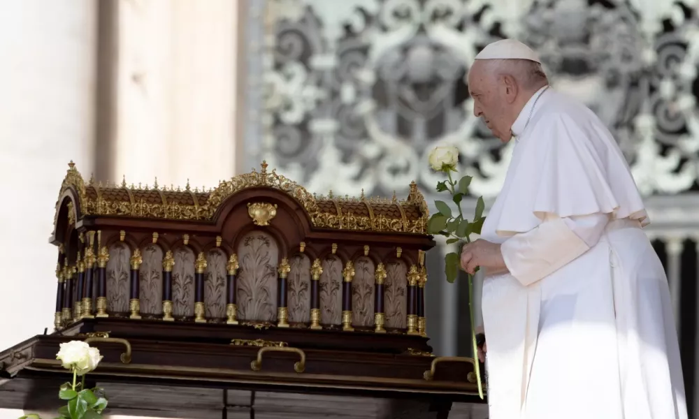 Pope Francis prayed before a relic of St. Therese of Lisieux at the beginning of his general audience in St. Peter's Square, and shortly before going to the hospital for an abdominal surgery, on June 7, 2023. Daniel Ibanez/CNA