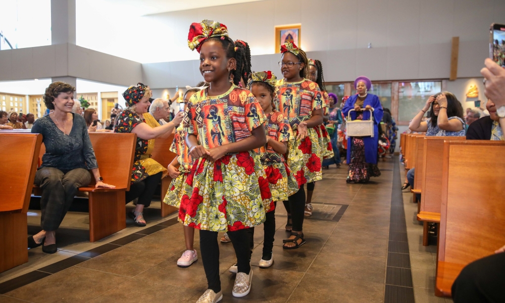 Participants in the 5th annual Diocesan African Mass joyfully process in. Photo by Chris Zuppa.