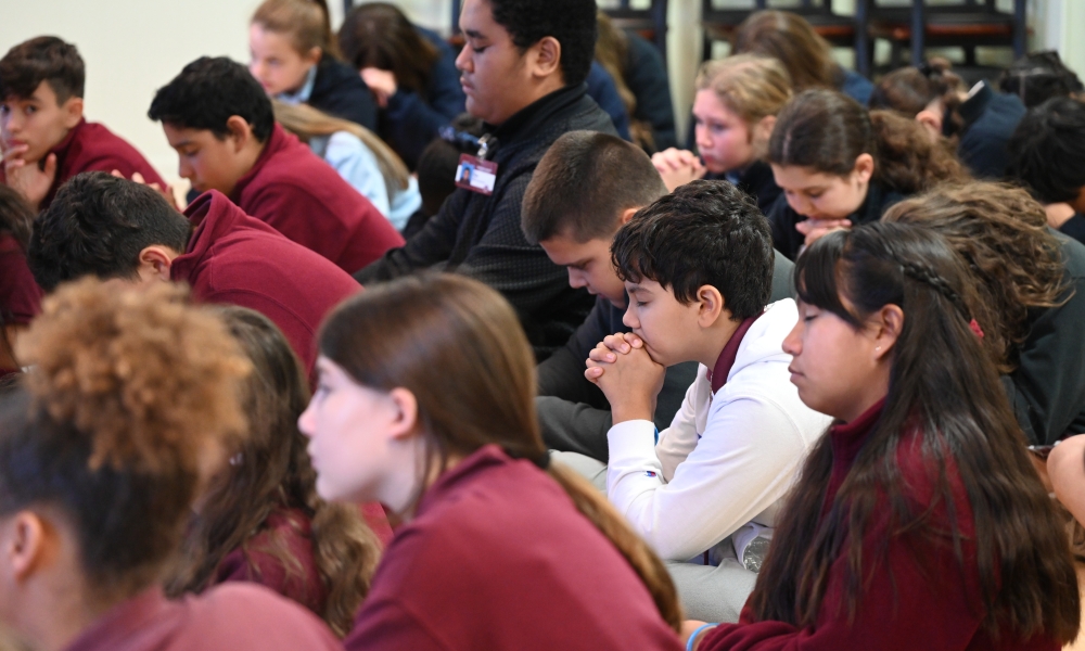 Sixth graders pray during Lectio Divina at Focus 11 on December 6. Photo by Brittany DeHaan