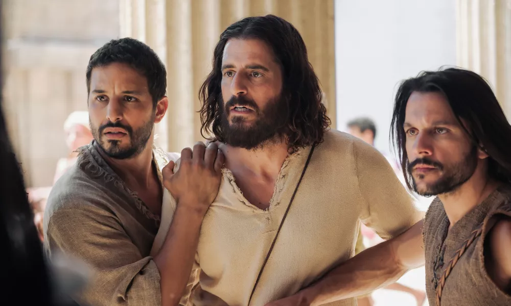 Left to right: Simon Zee (Alaa Safi), Jesus (Jonathan Roumie), and Simon Peter (Shahar Isaac) in Season Four of "The Chosen," releasing exclusively in theaters starting Feb. 1, 2024. | Photo by The Chosen/Mike Kubeisy.