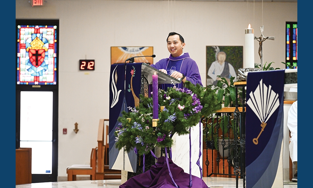 Father Dominic Long, SSS, celebrates Mass at St. Vincent de Paul Catholic Church in Holiday on December 3, 2023