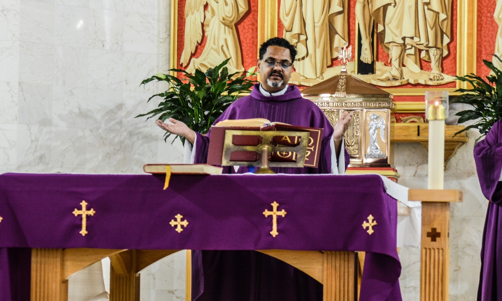Fr. Nelson Restrepo celebrates Mass at St. Joseph Catholic Church in Tampa.