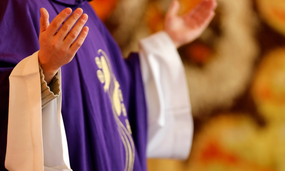 Priest Praying