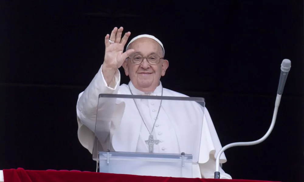 Pope Francis waves to pilgrims gathered in St. Peter’s Square for his Angelus address on Sunday, June 16, 2024. | Photo by Vatican Media.