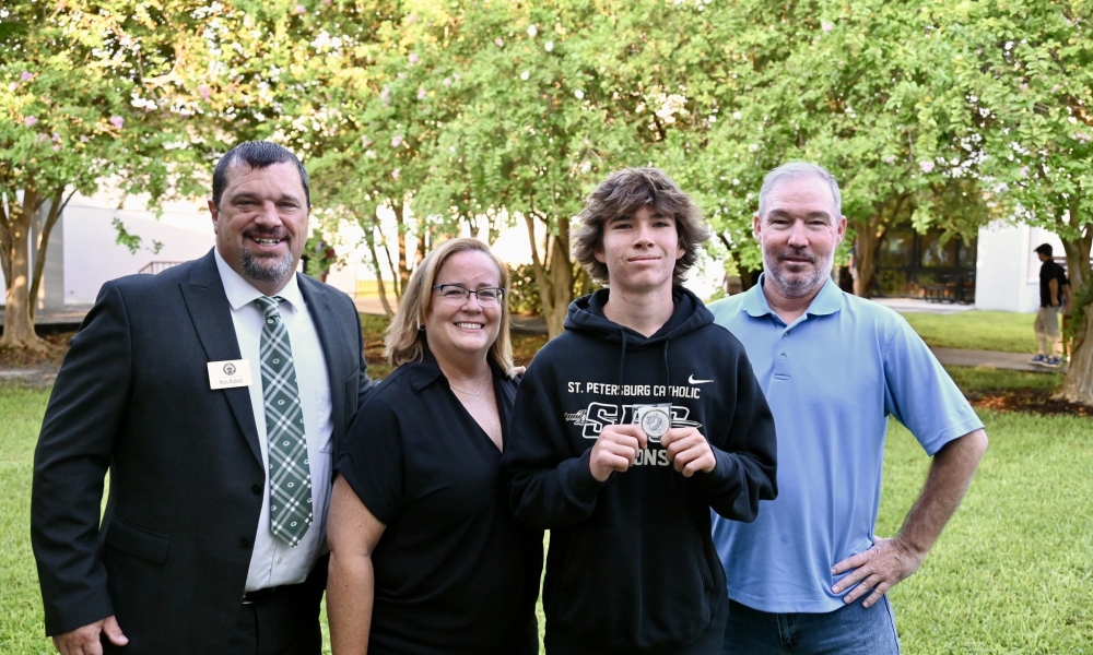 Jackson received the Challenge Coin during the school's convocation. | Photo from St. Petersburg Catholic High School.