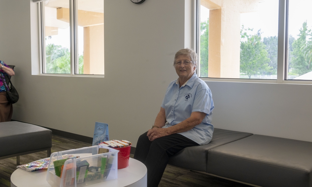 Sister Donna DeWitt sits in what was her former room in Holy Name Priory, which now is Saint Leo University’s new nursing program floor.