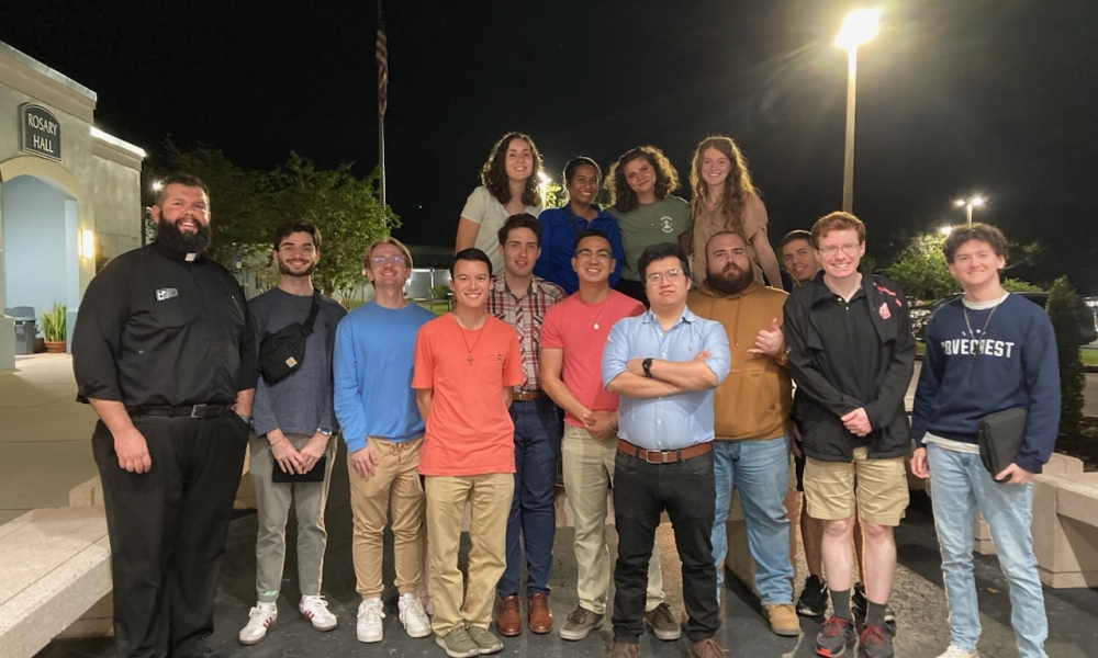 Fr. Chuck Dornquast and youth/young adults after a holy hour.