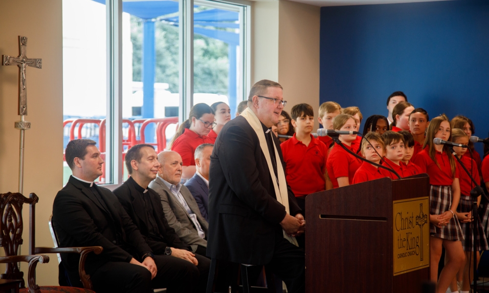 Bishop Parkes blessed Christ the King's new Bailey Center. | Photo by Shannon Koebbe.