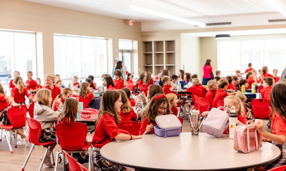 Students eat in the new dining hall.