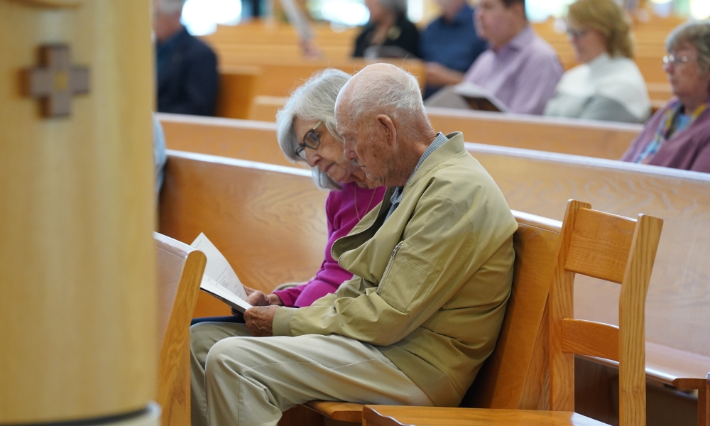 Many gather to pray at the Mater Dei Prayer Service. | Photo by Dana Rozance.