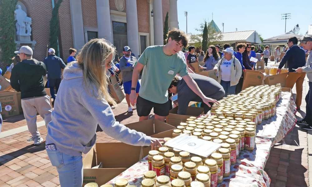 Students gather donated supplies