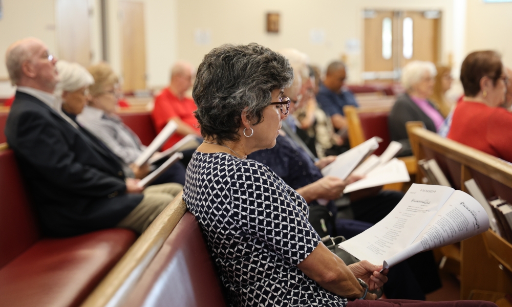 Many gather to pray at the Mater Dei Prayer Service. | Photo by Meegan Wright.