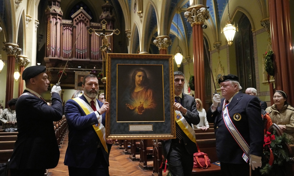 Knights of Columbus process with the new Knights of Columbus Sacred Heart Pilgrim Icon during a Mass and Sacred Heart Holy Hour at St. Mary's Church in New Haven, Connecticut, Jan. 3, 2025. (Photo by Paul Haring)