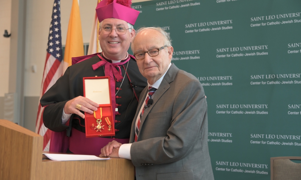 Bishop Mark O’Connell, auxiliary bishop of the Archdiocese of Boston, presented Rabbi A. James Rudin with the Papal Knighthood of the Order of St. Gregory on behalf of Pope Francis.
