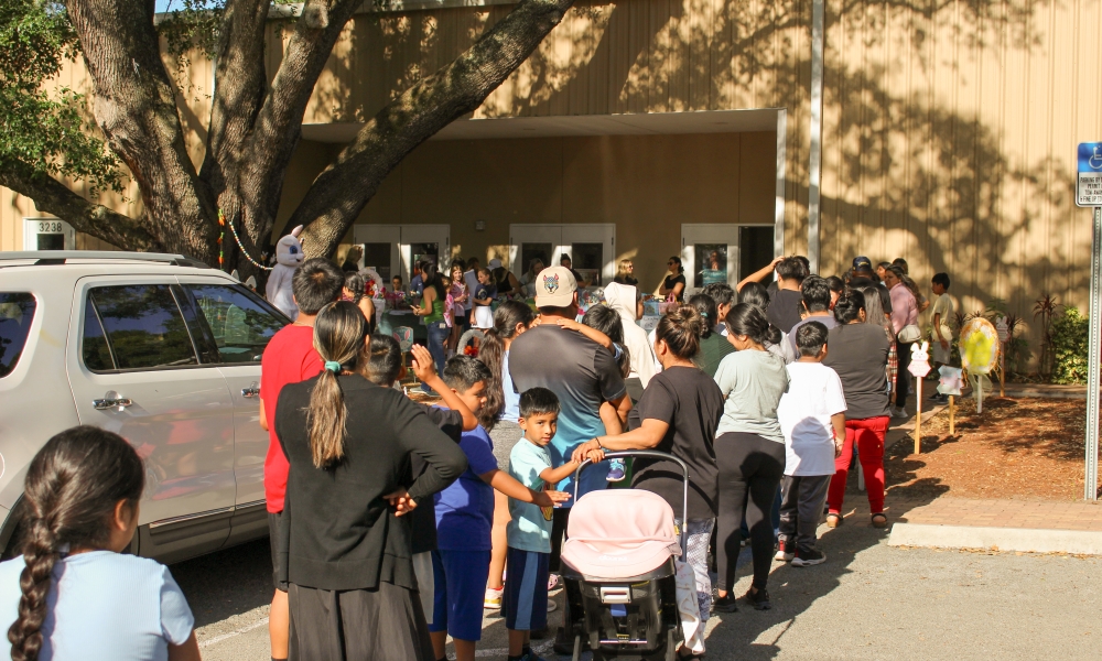 Many wait in line for baskets at the Easter Baskets of p-LENT-y drive.