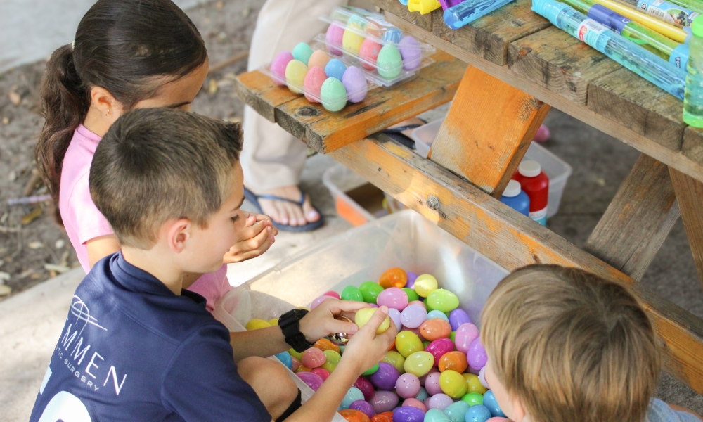 Children collect eggs at the Easter Baskets of p-LENT-y drive.