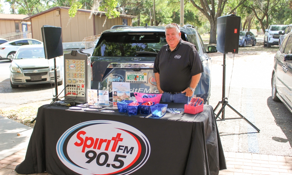 John Morris represents Spirit FM at the Easter Baskets of p-LENT-y drive.