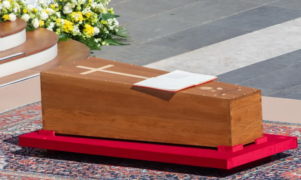 A view of the coffin of Pope Francis resting before the altar at the funeral Mass on St. Peter’s Square, April 26, 2025. Credit: Daniel Ibáñez/CNA