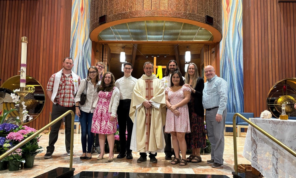 Members of the young adult group attended the Easter Vigil together, supporting those who entered the Church. | Courtesy photo.