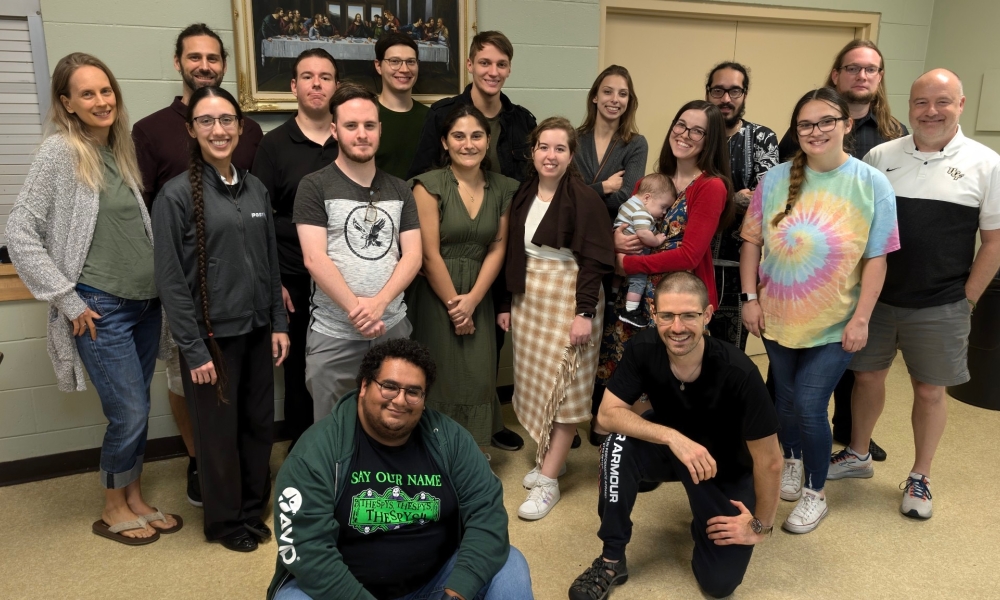 The young adult group gathers to celebrate Thanksgiving in 2024.