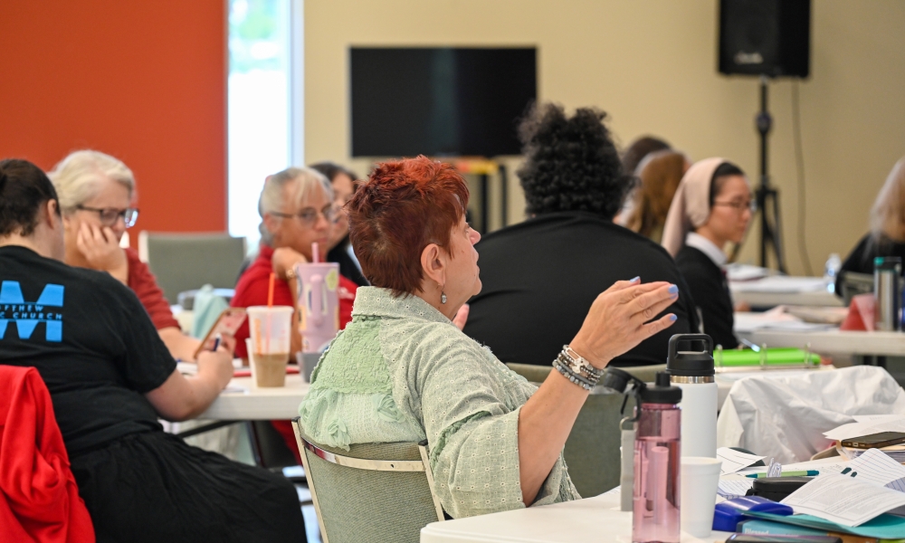 A parish group works together at the Parents and Families at the Center of Faith Formation workshop on May 31, 2025. | Photo by Brittany DeHaan.
