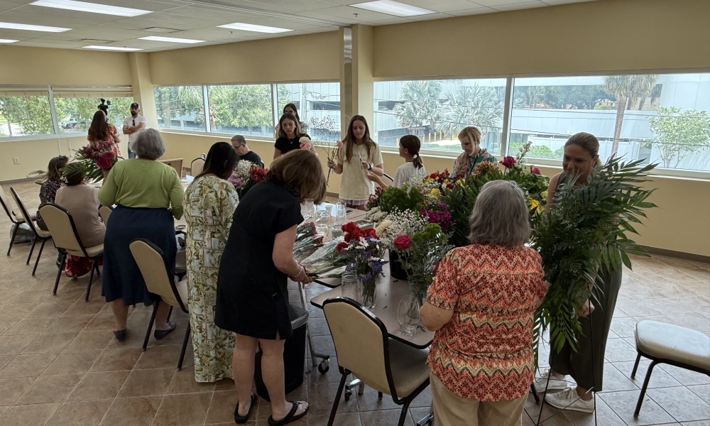 Participants gathered to create bouquets.