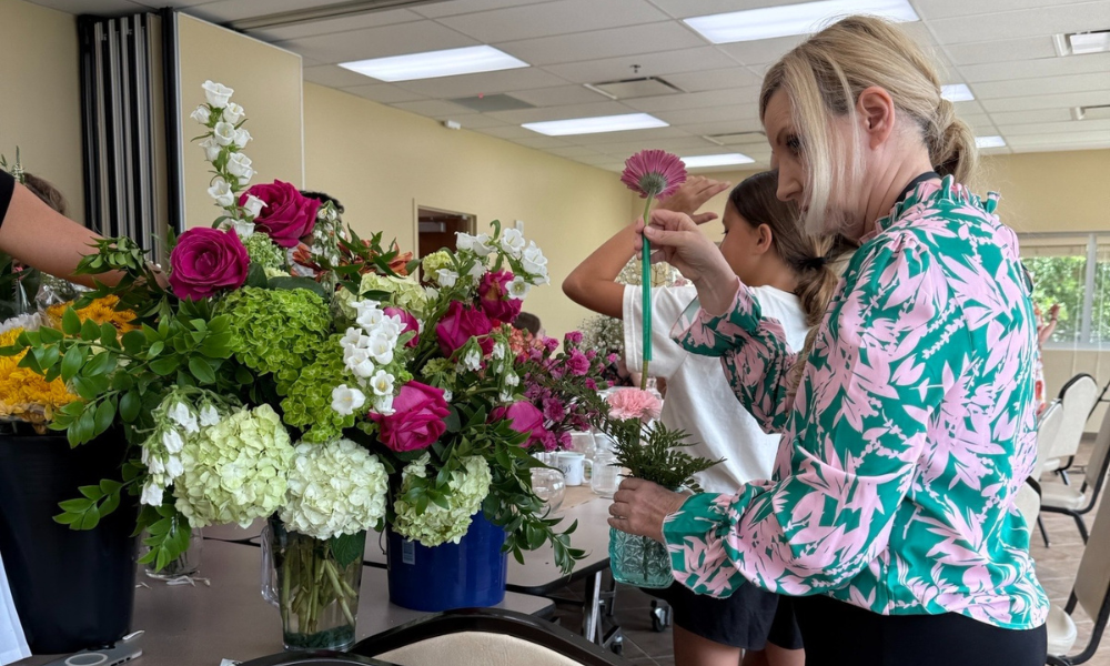 Participants gathered to create bouquets.