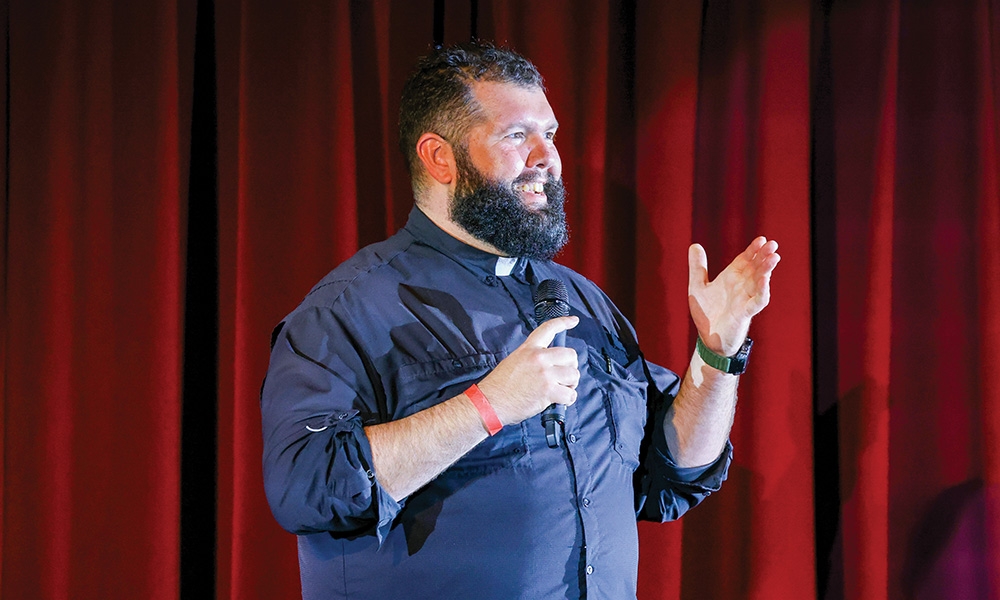 Father Chuck Dornquast speaking