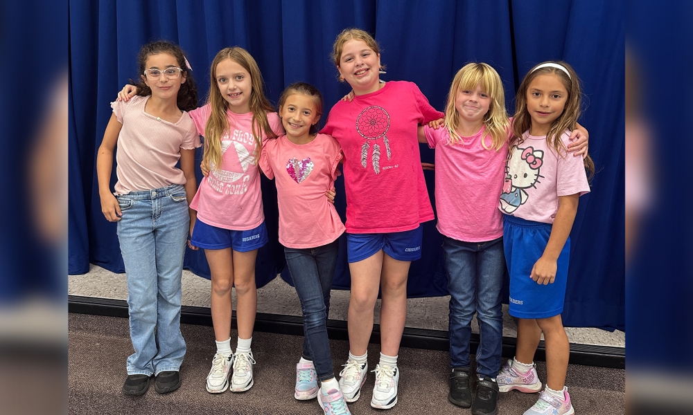 School children wearing pink.