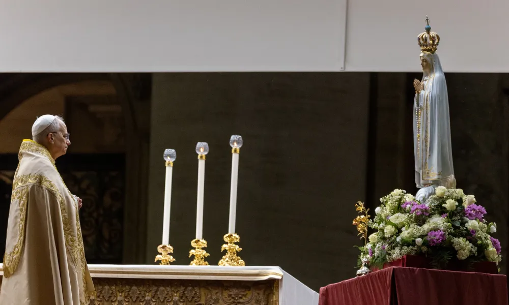 Pope Leo XIV stands before the original Our Lady of Fatima statue at a Marian vigil in St. Peter’s Square, Rome, Saturday, Oct. 11, 2025. Credit: Daniel Ibáñez/CNA