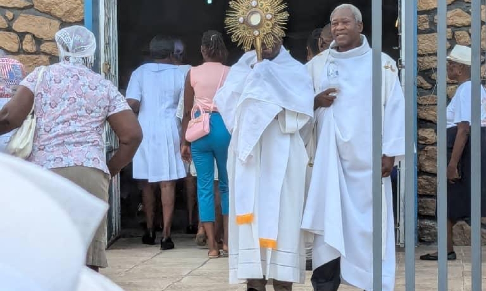 Fr. Bernard and the community of Maison St. Vincent de Paul in Haiti