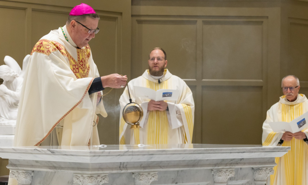 Bishop Gregory Parkes incenses the new altar.