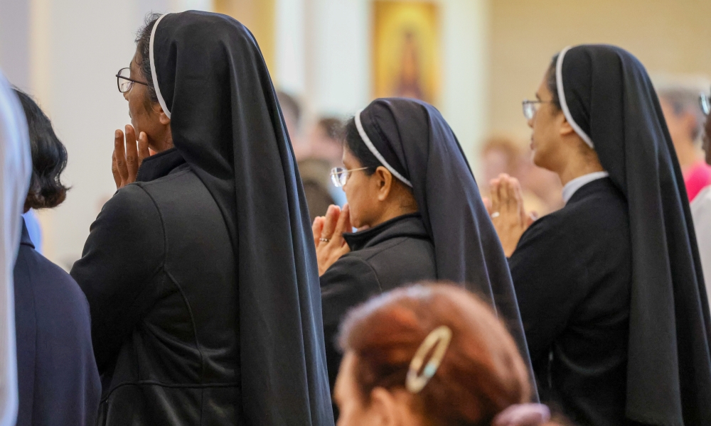 Religious sisters pray at the 2024 Religious Jubilee Mass. | Photo by Dana Rozance.