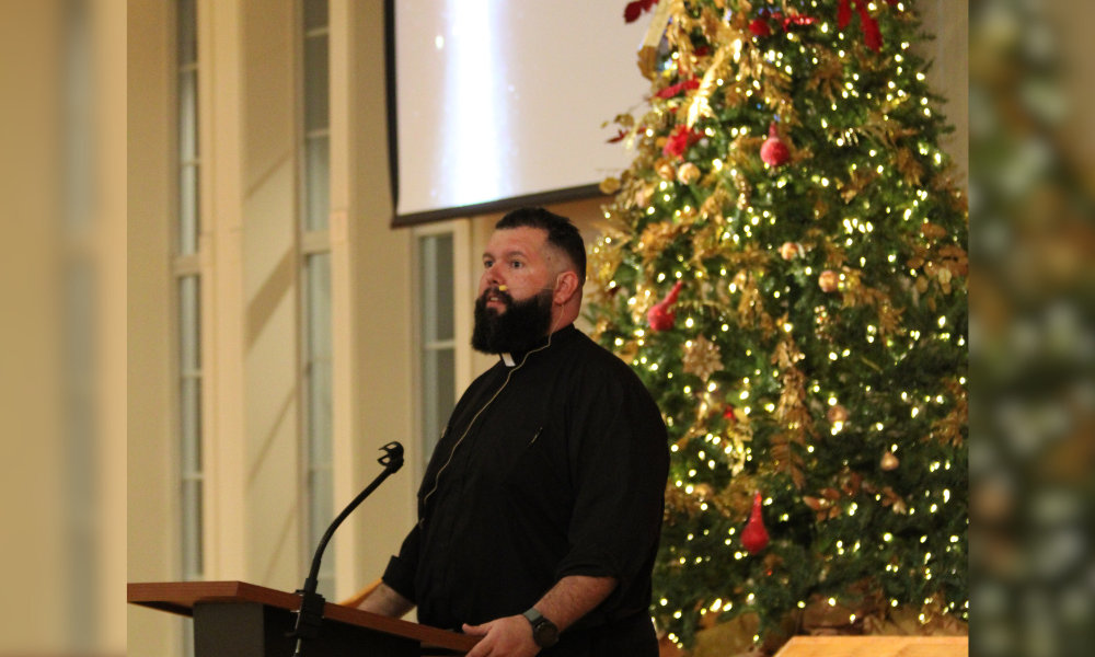 Father Chuck Dornquast, pastor at St. Lawrence Catholic Church, gives an Advent reflection at the "And He Dwelt Among Us" event. | Courtesy photo.
