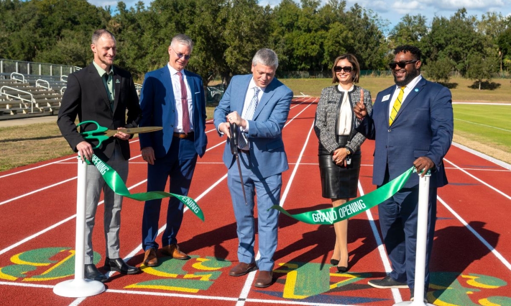 Ribbon-cutting at the track, from left to right: Nick Spino, head track and field coach; Dr. Jim Burkee, president; James Detuccio, chief operating officer / chief financial officer; Hanen Burkee, assistant vice president of center for global engagement; and Marcal Lazenby, vice president of athletics and wellness.