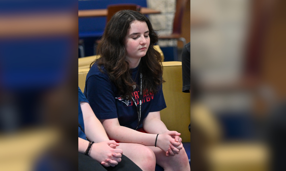 A student prays
