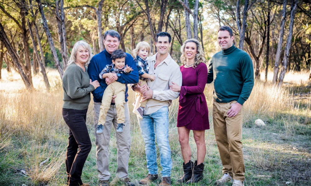The Mitchell Family, from left to right: Becky, Dewey holding grandson Jimmy, son-in-law James holding grandson Bohdi, daughter Carly, and son Derek.