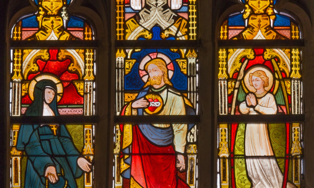 Jesus shows His Sacred Heart to St. Margaret Mary Alacoque.